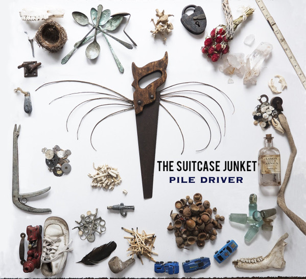 SUITCASE JUNKET – SUITCASE JUNKET – PILE DRIVER
