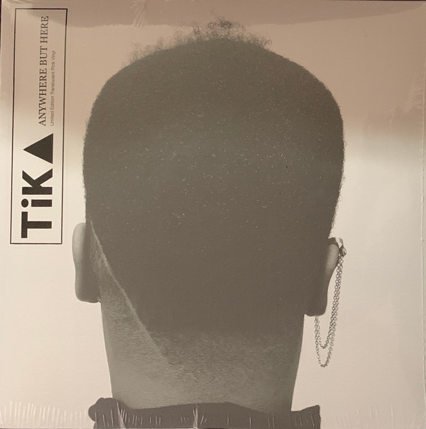 TIKA – TIKA – ANYWHERE BUT HERE .. HERE / TRANSLUCENT PINK VINYL