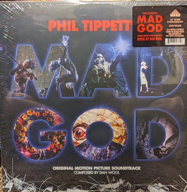 WOOL, DAN – WOOL, DAN – PHIL TIPPETT'S MAD GOD .. MAD GOD / 180GR. RED WITH BLUE & WHITE SPLATTER