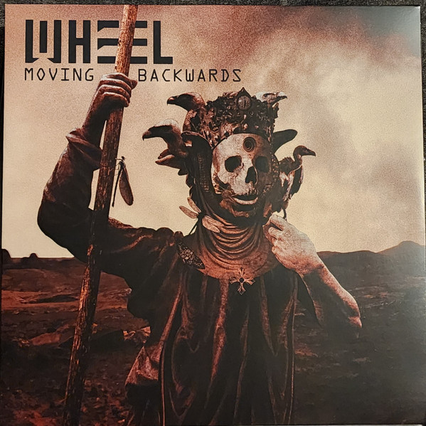 WHEEL – WHEEL – MOVING BACKWARDS NATURAL