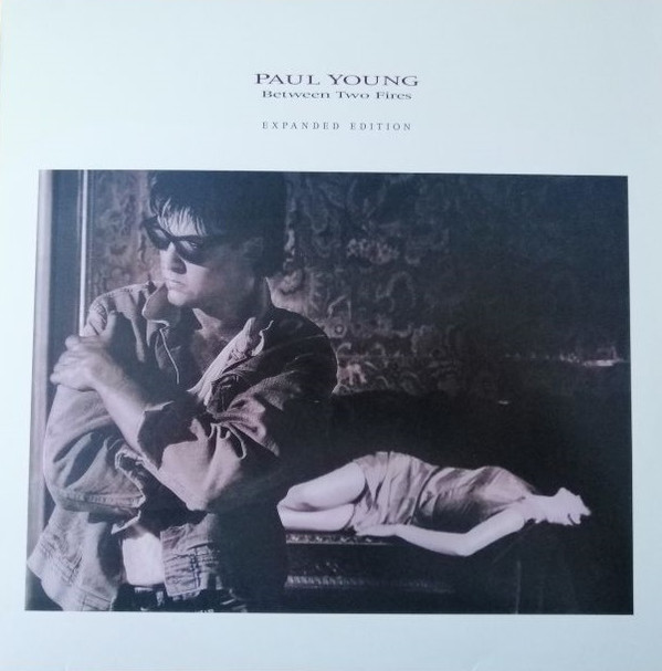 YOUNG, PAUL – YOUNG, PAUL – BETWEEN TWO FIRES FLAME RED 180G